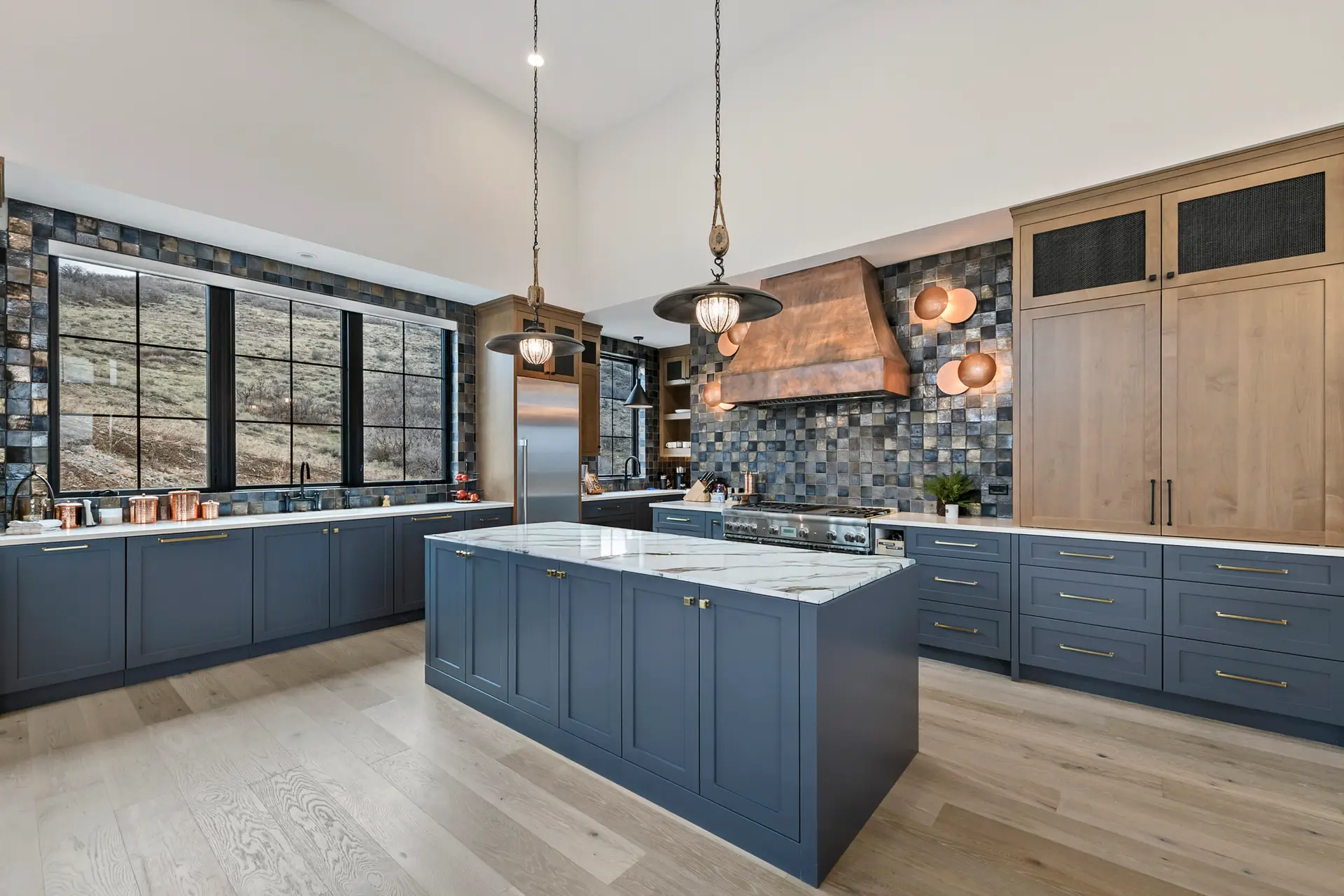 Park City, Utah, luxury kitchen with painted cabinets and walls, created by Christopher Painting, Utah, and Park City's premier painting, interior, and exterior fine-finishes artisan.